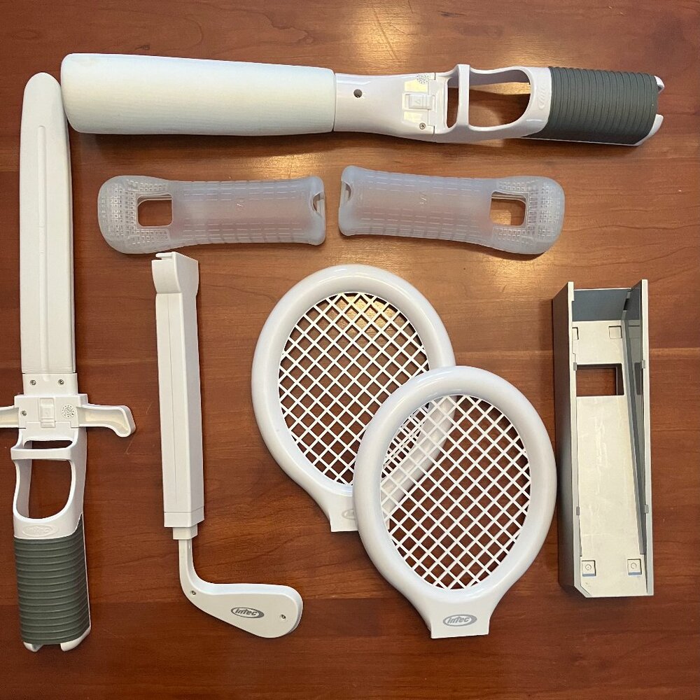 Lot Of Nintendo Wii Accessories Golf Tennis Baseball Sword etc.